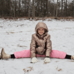 Claire is stretching