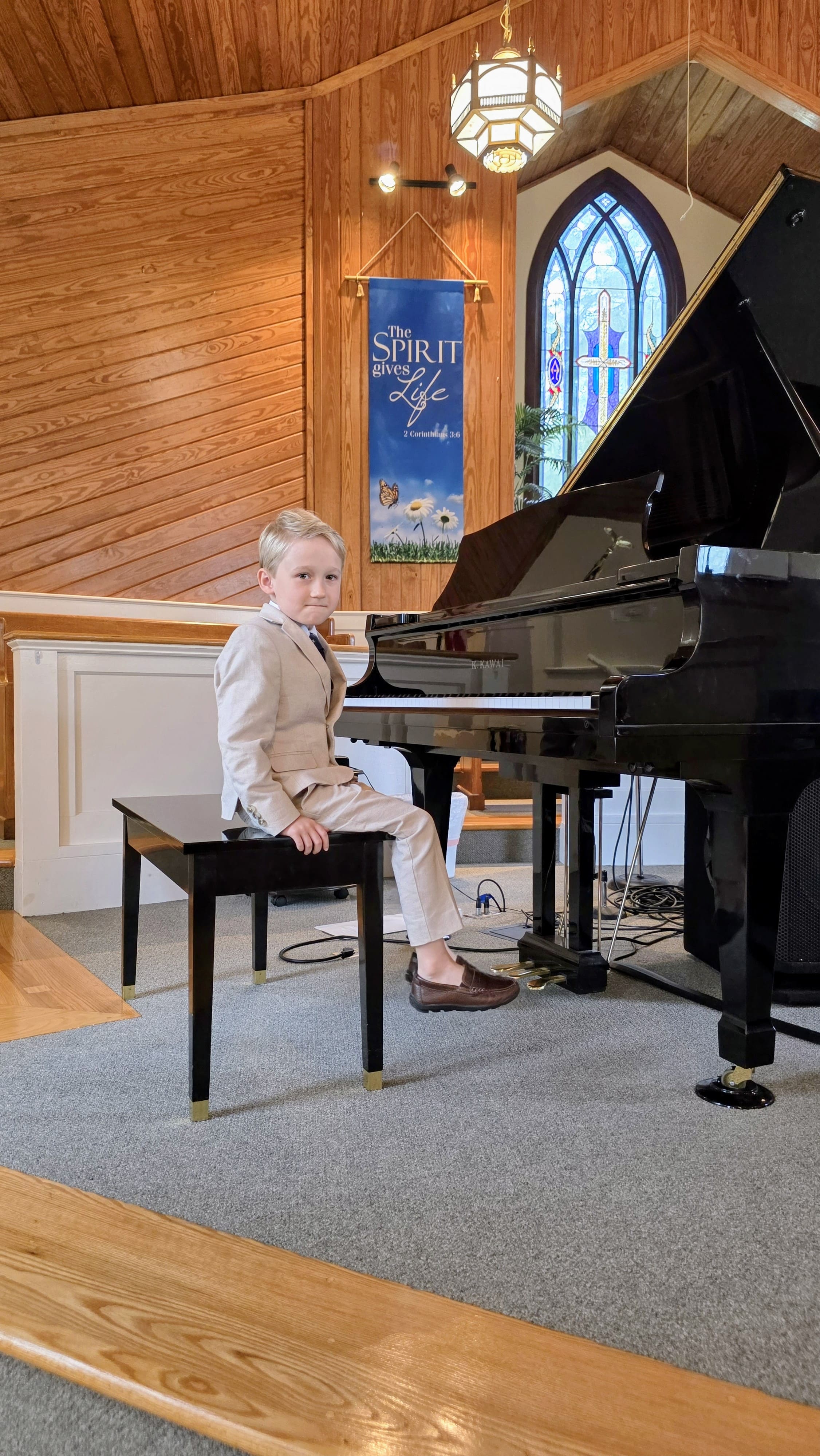 Child learning perseverance and confidence through a challenging activity