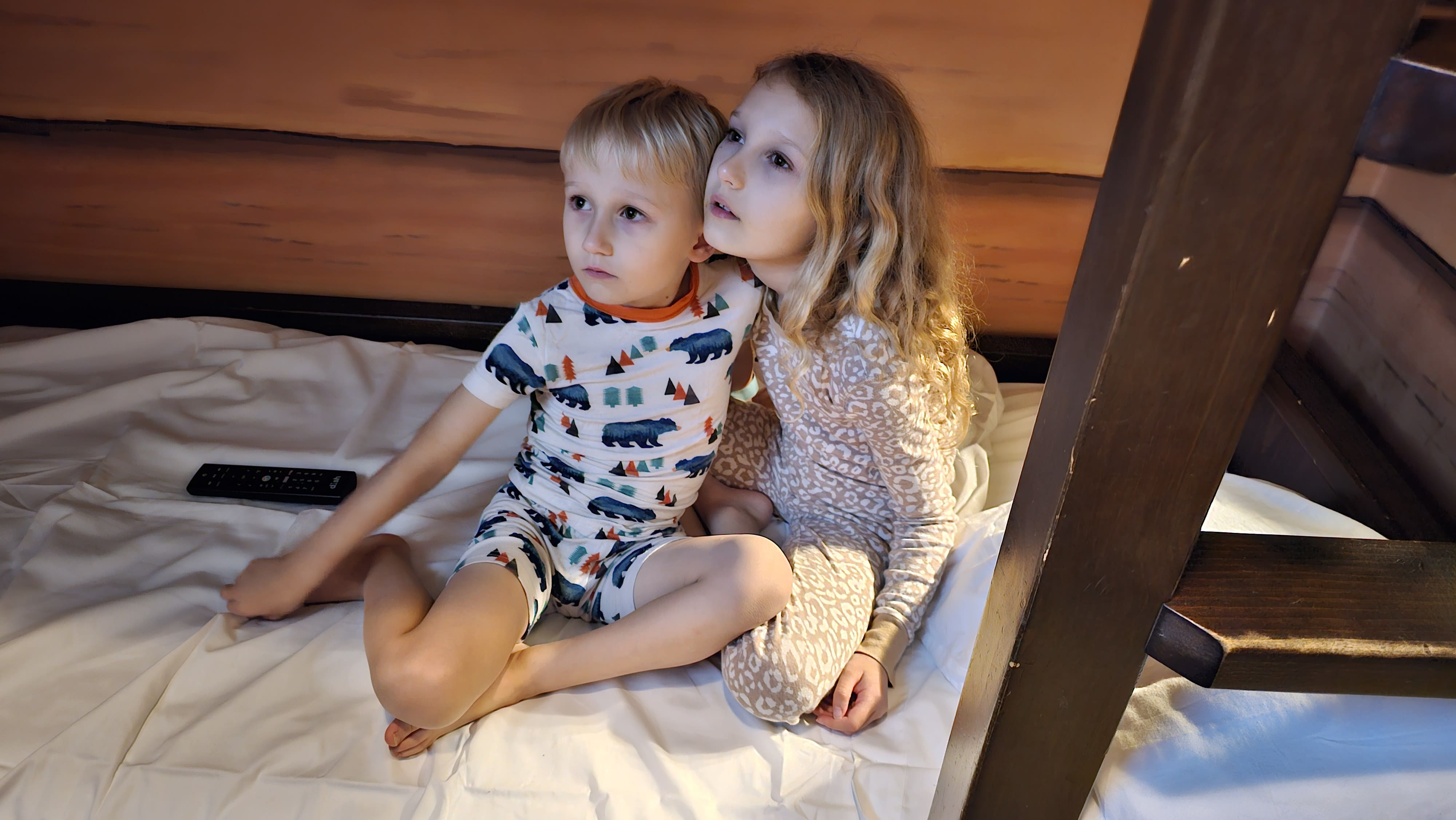 Two children spending a cozy evening together