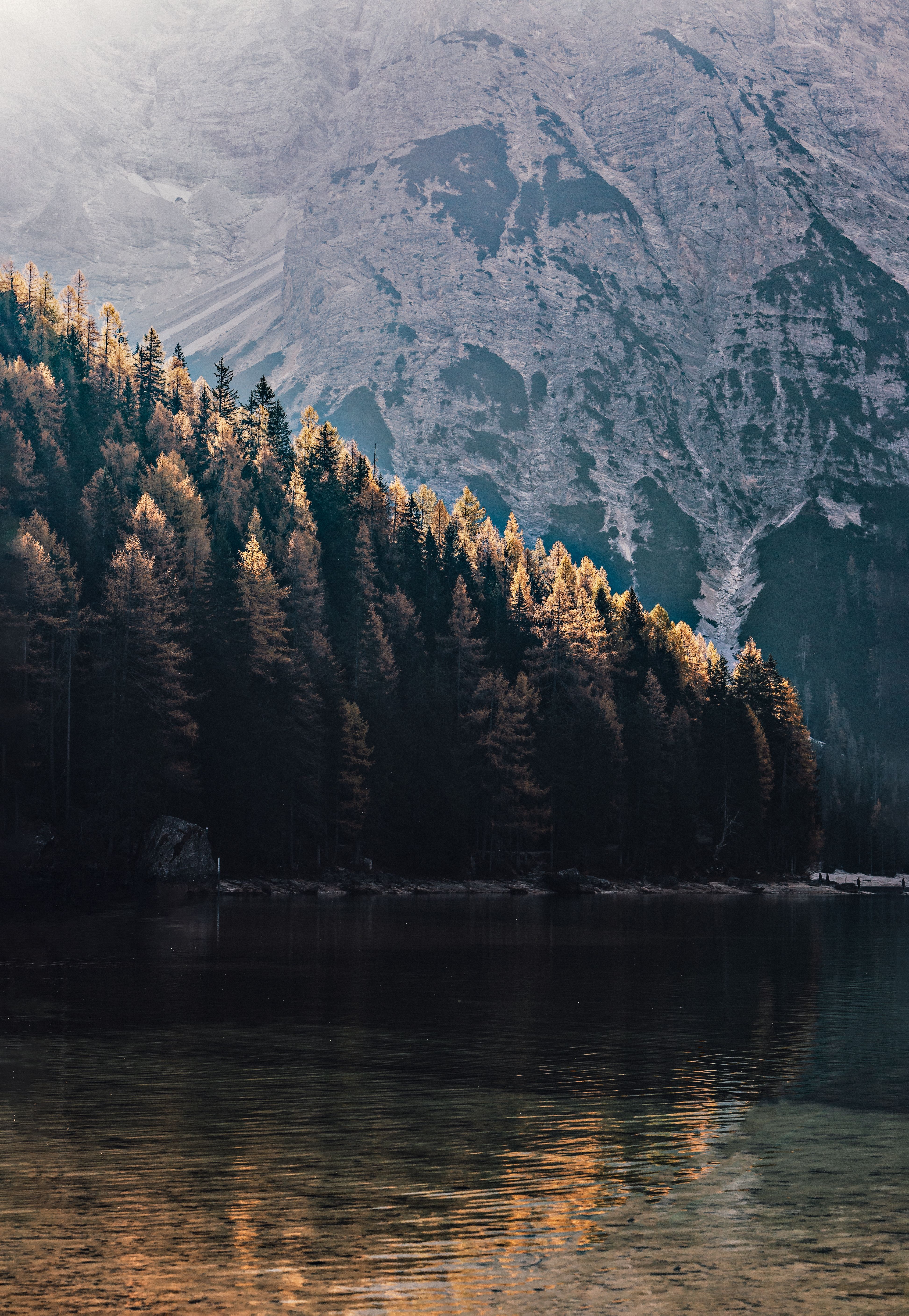 Reflection, Belonging and Emotional Perspective Peaceful mountain lake surrounded by forest, representing reflection and emotional perspective